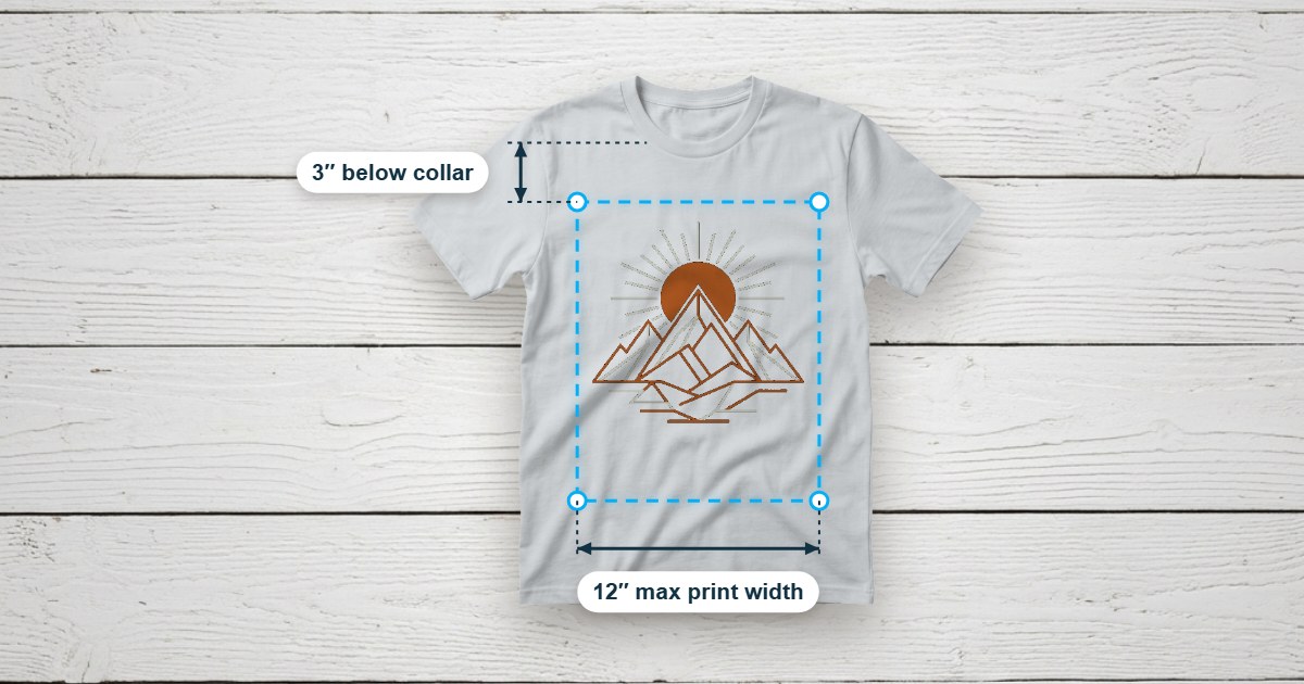 T-shirt flatlay with a dashed print-area overlay showing placement measurements